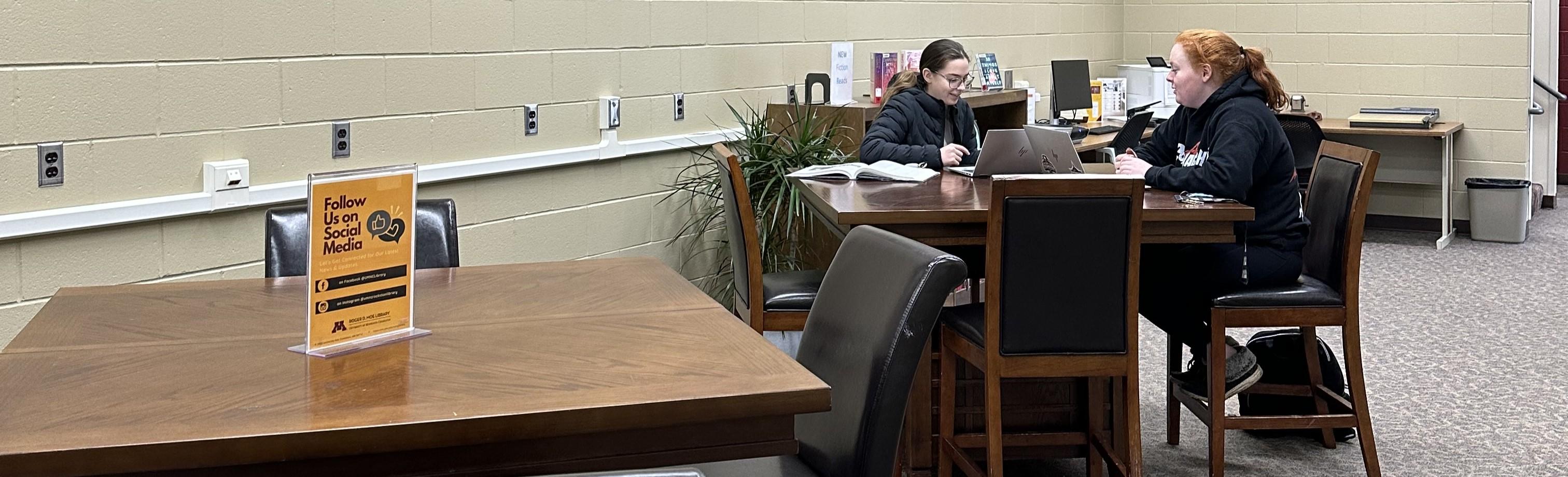 students in Roger D. Moe Library