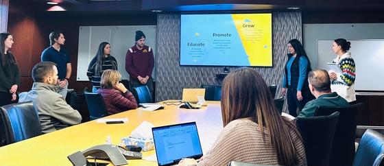 Marketing students presenting to the Crookston CVB in the Business Boardroom