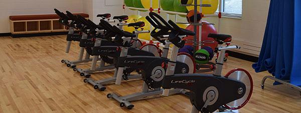 Wellness Center's multipurpose room with spin bikes and other cardio equipment